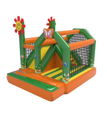Casa gonfiabile verde arancione con scivoli per bambini